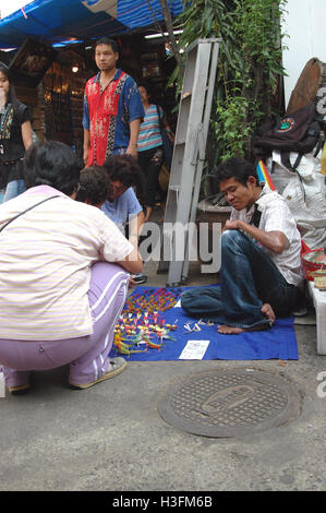 Straw folding craftsman Bangkok Stock Photo