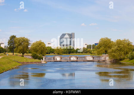 Minsk, Belarus - June 18, 2015: Modern building of National library of Belarus, view from the beautiful park on the river. Stock Photo