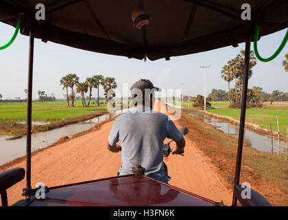 tuk-tuk driver in countryside near Siem Reap, Cambodia. Stock Photo