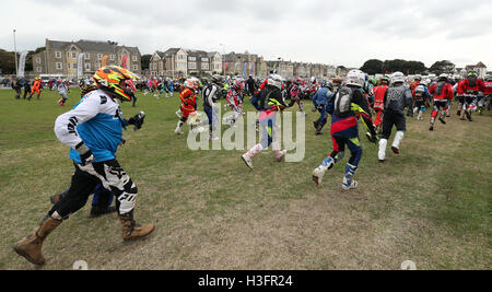 Sidecar riders in the race in the difficult terrain Stock Photo