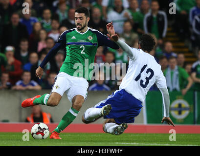 Northern Ireland's Conor McLaughlin (left) and San Marino's Alessandro Della Valle battle for the ball during the 2018 FIFA World Cup Qualifying match at Windsor Park, Belfast. Stock Photo