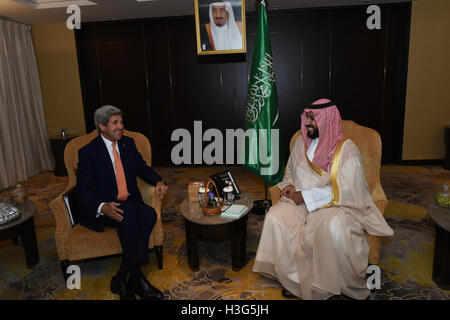 U.S. Secretary of State John Kerry chats with Saudi Arabia's Deputy Crown Prince and Defense Minister Mohammad bin Salman Al Saud before a bilateral meeting in Hangzhou, China on September 4, 2016. Stock Photo