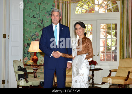 U.S. Secretary of State John Kerry shakes hands with Burmese State Counselor Aung San Suu Kyi at the Blair House in Washington, D.C. on September 14, 2016. Stock Photo