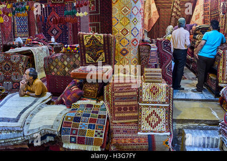Iran, Fars Province, Shiraz, carpet bazaar Stock Photo