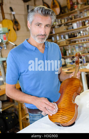 the finished repaired violin Stock Photo