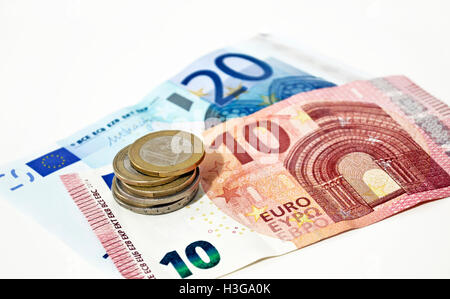 save money concept  - euros and coins Stock Photo