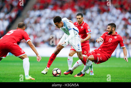 London, UK. 8th Oct, 2016. Dele Alli (2nd, L) of England vies with Ryan Camilleri (1st, R) of Malta during the Group F match at 2018 FIFA World Cup European Zone Qualifiers at Wembley Stadium in London, England, on Oct. 8, 2016. England won 2-0. Credit:  Han Yan/Xinhua/Alamy Live News Stock Photo