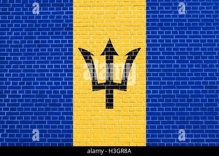 Barbadian national official flag. Patriotic symbol, banner, element, background. Flag of Barbados on brick wall texture