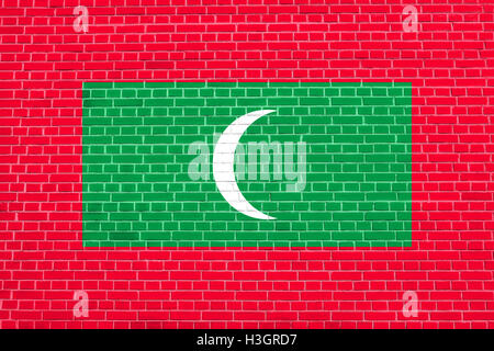 Maldivian national symbol. Patriotic background design. Flag of Maldives on brick wall texture background Stock Photo