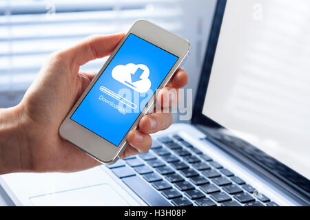 Cloud downloading on mobile phone Stock Photo