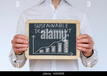 Successful sustainable development chart on chalkboard Stock Photo