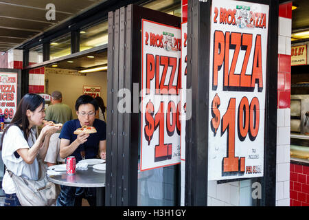 New York City,NY NYC Manhattan,Hell's Kitchen,Two Brothers,2 Bros Pizza,restaurant restaurants food dining cafe cafes,pizzeria,fast food,pizza slice,p Stock Photo