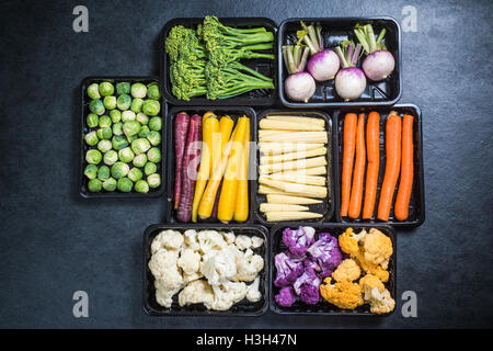 Colorful vegetables in trays overhead view Stock Photo