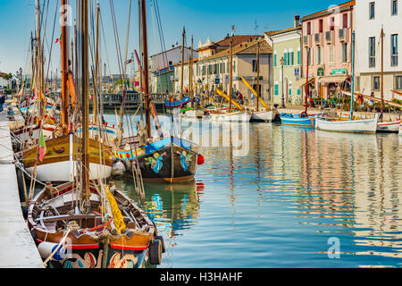 Boats moored in the harbor channel in Rimini, Italy Stock Photo - Alamy