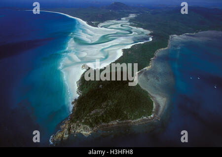 Whitehaven Beach with Tongue Point and Hill Inlet. Stock Photo