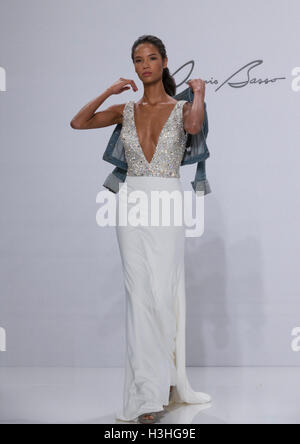 New York, NY USA - October 5, 2016: Model walks runway for collection by Dennis Basso during New York Bridal week at Kleinfeld Stock Photo