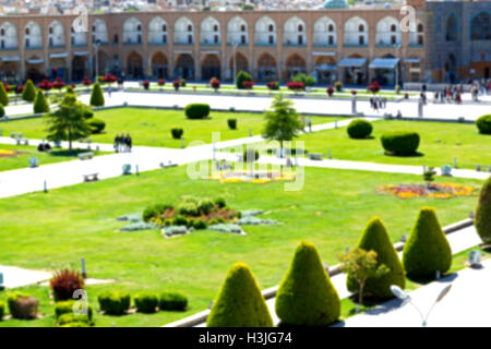 blur in iran   the old square of isfahan prople garden tree heritage tourism and mosque Stock Photo