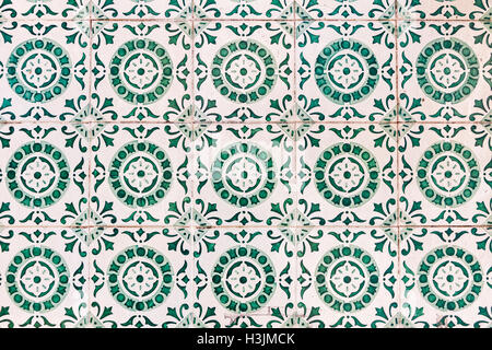 Typical Portuguese old ceramic wall tiles (Azulejos) on the building exterior in Lisbon city, Portugal. Seamless pattern can be  Stock Photo