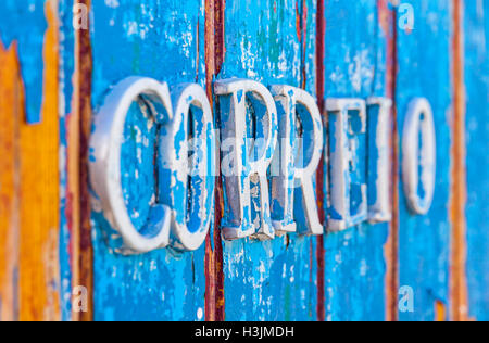 Details of Vintage Portuguese wooden postbox (portuguese: Correio) on the street of Cascais city, Portugal Stock Photo