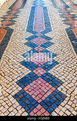 Coloured ornamental paving tiles in Lagos city, Portugal Stock Photo