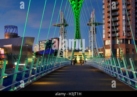 The Lowry Footbridge and Lowry Centre, Salford Quays, Greater Manchester, England, UK Stock Photo