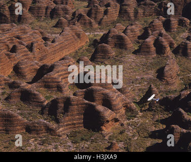 Light aircraft flying over the Bungle Bungle Range, Stock Photo