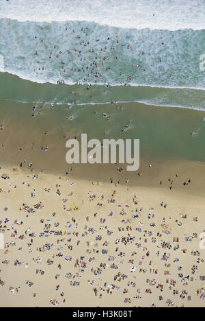 Swimmers and sunbathers on Bondi Beach. Stock Photo