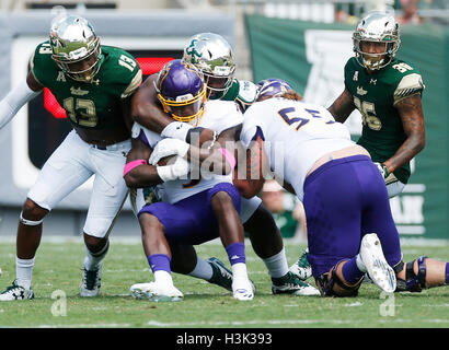 City, Florida, USA. 8th Oct, 2016. OCTAVIO JONES | Times .East Carolina Pirates running back Anthony Scott (3) tackled for a short gain by the South Florida Bulls defense in the first quarter at Raymond James Stadium in Tampa, Florida on Saturday, October 8, 2016. © Octavio Jones/Tampa Bay Times/ZUMA Wire/Alamy Live News Stock Photo