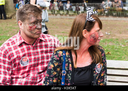 London, UK, 8 October 2016. Zombies in Central London celebrating World Zombie Day while raising funds for St Mungo's supporting the Homeless. Credit: pmgimaging/Alamy Live News Stock Photo