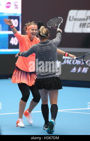 Beijing, Beijing, China. 9th Oct, 2016.  American professional tennis player Bethanie Mattek-Sands and Czech tennis player Lucie Safarova celebrate with each other after they win the championship in women's doubles at the China Open in Beijing, October 9th, 2016. Credit:  SIPA Asia/ZUMA Wire/Alamy Live News Stock Photo