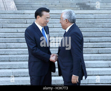 Beijing, China. 9th Oct, 2016. Chinese Premier Li Keqiang (L) shakes hands with Portuguese Prime Minister Antonio Costa in Beijing, capital of China, Oct. 9, 2016. Credit:  Pang Xinglei/Xinhua/Alamy Live News Stock Photo