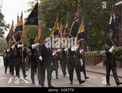 Brentwood, Essex, 9th October 2016, Royal British Legion Standards leads 124 Transport Squadron for a Freedom of Entry march in Brentwood, Essex with heavy rain Credit:  Ian Davidson/Alamy Live News Stock Photo