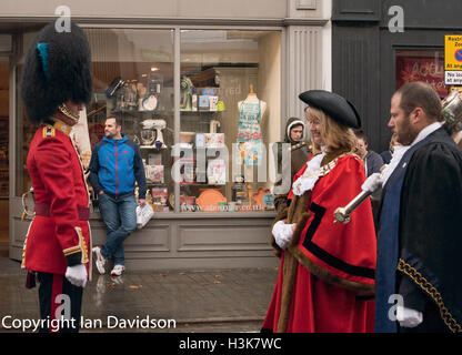 brentwood, Essex, 9th October 2016, The Mayor of Brentwood, Councilor Noelle Hones, talks to the officer commanding the Irish Guards band at the 124 Transport Squadron in Freedom of Entry ceremony in Brentwood, Essex with heavy rain Credit:  Ian Davidson/Alamy Live News Stock Photo