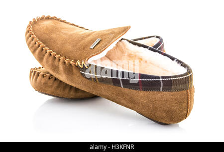 Pair Of mens Barbour Sheepskin Moccasins Slippers Soft Soled Shoes on a white background Stock Photo