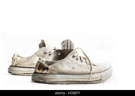 old sneakers isolated on white Stock Photo