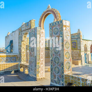 The scenic ruins covered with glazed tiles on the roof of the mansion in Medina of Tunis, Tunisia. Stock Photo