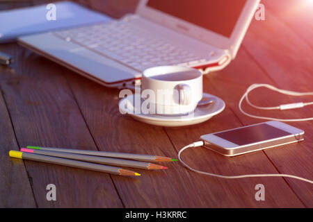 Side view of working Place on natural wooden Table Stock Photo