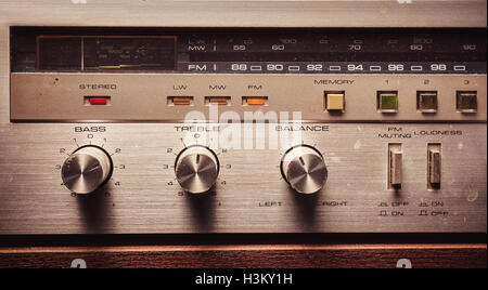 Details of an old radio receiver, close up view control knobs and buttons. Stock Photo