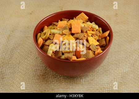 Cheese flavored Party snacks in red bowl Stock Photo