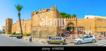 The huge towers next to the Bab El Kasbah Gates, the crowded entrance to the Medina in Sfax. Stock Photo