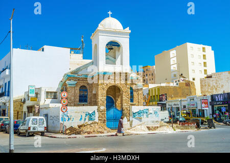 The abandoned Greek Orthodox church next to the Medina walls waits for restoration in Sfax. Stock Photo