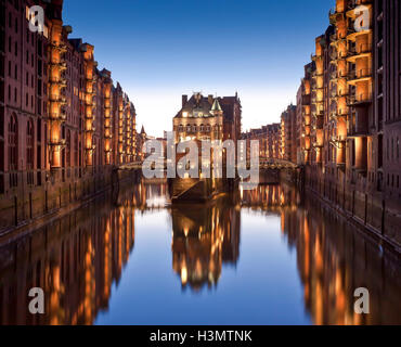 Hamburg, historic Warehouse District Speicherstadt, Canal and Fleetinsel with Double Bridge Stock Photo