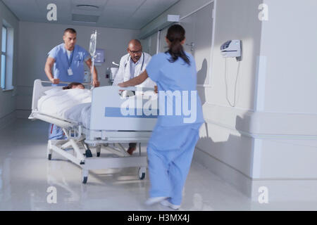Doctor and medical running with patient bed in hospital emergency Stock Photo