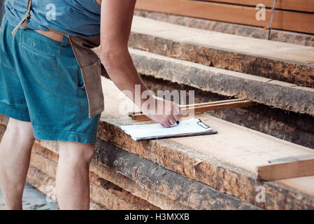 Carpenter working in workshop Stock Photo