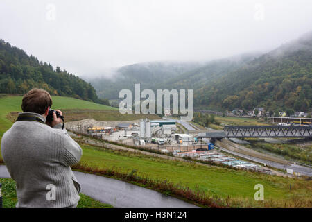 Gloggnitz: construction of Semmering Base Tunnel: start of tunnel, visitor takes picture, Wiener Alpen, Alps, Niederösterreich, Stock Photo