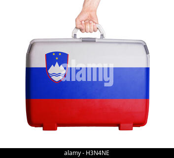 Used plastic suitcase with stains and scratches Stock Photo