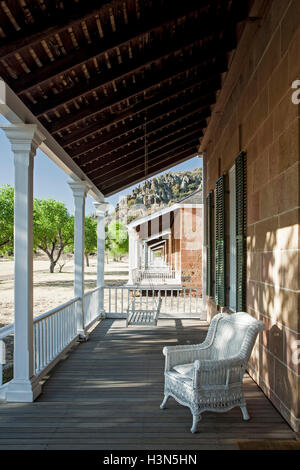 Balcony and chair, Commanding Officer's Quarters, Fort Davis National Monument, Fort Davis, Texas USA Stock Photo