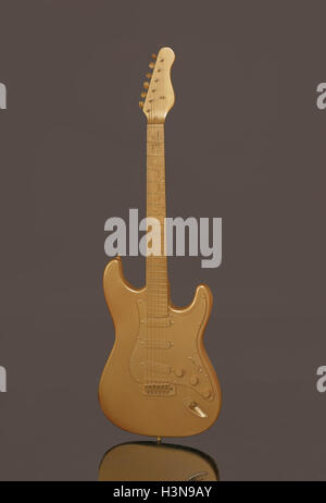 Gold Electric Guitar on Dark Background Stock Photo