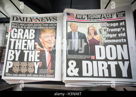 New York newspapers on Saturday, October 8, 2016 report on the Republican presidential candidate Donald Trump's New York papers report on Republican presidential misogynistic comments. The comments were released by the Washington Post and took place on a hot mike during an NBC television appearance in 2005. (© Richard B. Levine) Stock Photo