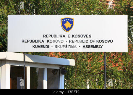 Signpost at the entrance of the National Assembly in Pristina, Kosovo Stock Photo